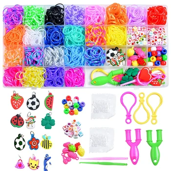 An organized assortment of colorful rubber bands, beads, and charm accessories for creative crafting.